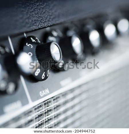 volume button guitar amplifier  closeup