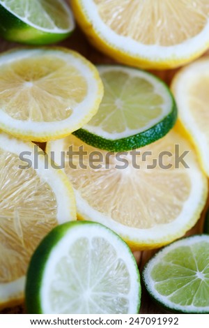 Slices of various citrus fruits with shallow depth of field