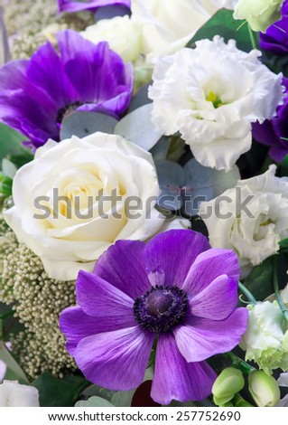 Bouquet. Purple anemone is in the foreground Selective focus with shallow depth of field