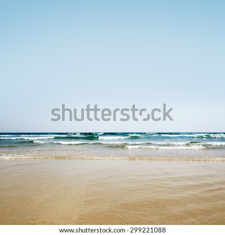 tropical sea under the blue sky beach background wave of the sea on the sand beach