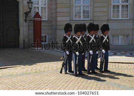 COPENHAGEN, DENMARK - JUNE 22: Royal Guards during the ceremony of changing the guards at Amalienborg Castle on June 22, 2011 in Copenhagen, Denmark