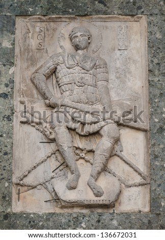 Bas-relief of St. George, a warrior saint, at the facade of St. Mark\'s Basilica