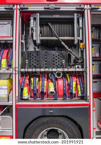 ALMERE, NETHERLANDS - 12 APRIL 2014: Part of the interior of a modern Dutch fire engine showing tools and equipment on display during the first National Security Day held in the city of Almere