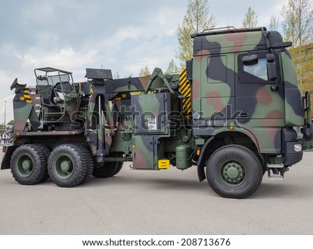 ALMERE, NETHERLANDS - 23 APRIL 2014: Dutch military tow truck on display during the National Army Day in Almere can be inspected by the general public at close range