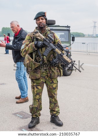 ALMERE, NETHERLANDS - 23 APRIL 2014: Soldier in full gear on National Army Day, meamt to get the general public acquainted with the army