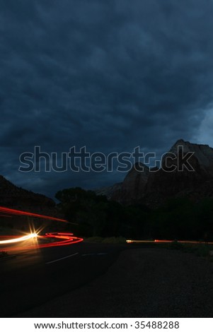 View of traffic trails as cars come and go inside Zion National Park, Utah, USA.