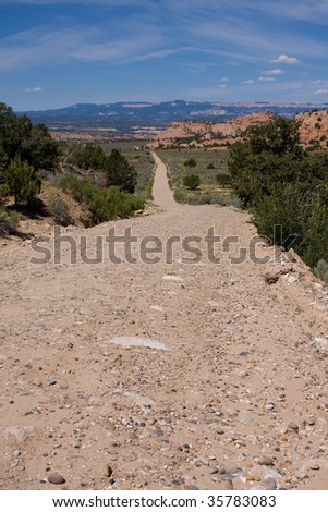 Dirt and gravel road in the Utah countryside. Hole in the Rock road outside Escalante, Utah.