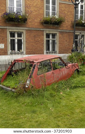 France, Boulogne Sur Mer, old cars in a strange garden, cars vs nature