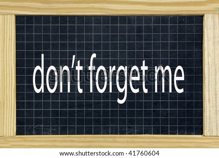 don\'t forget me wrote on a chalkboard