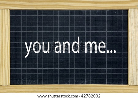 you and me wrote on a chalkboard