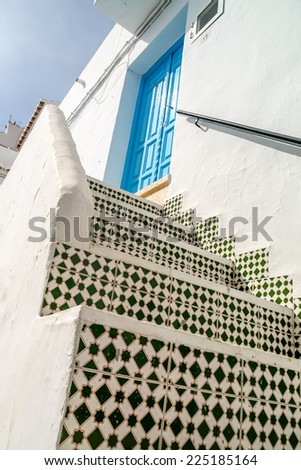 view of stairs of one house in frigiliana, pueblo blanco, spain
