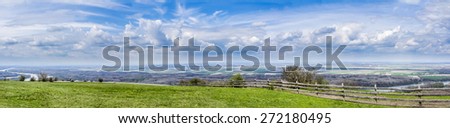 panorama view of austrian landscape with wind mills in the background