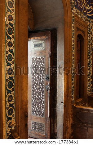Historical hand crafted wooden door and entrance of an Ottoman tomb in Istanbul, Turkey. Suleiman the Magnificent.