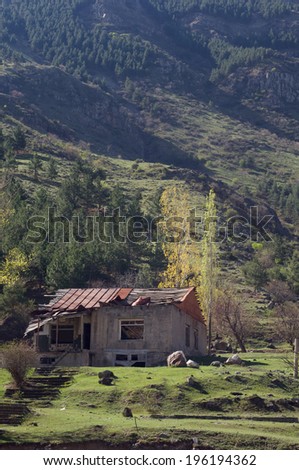 old deserted house near mountain slope, Georgia