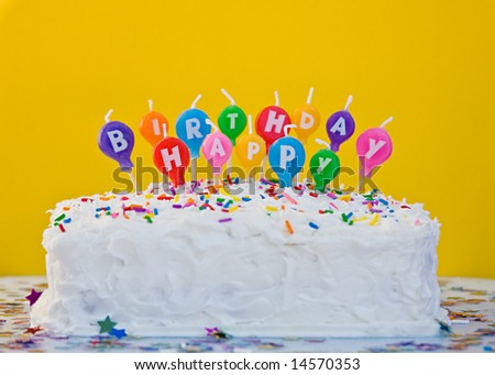 stock photo : Cake with happy birthday balloon shaped candles