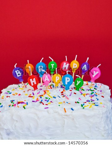 Birthday Cake  Candles on Cake With Happy Birthday Balloon Candles Stock Photo 14570356