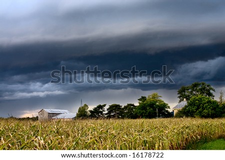 Thunderstorm approaching a rural farm