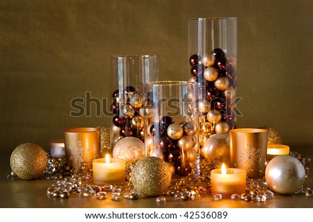 Christmas Decorations on Gold  Pearl And Brown Christmas Decorations With Brightly Lit Candles
