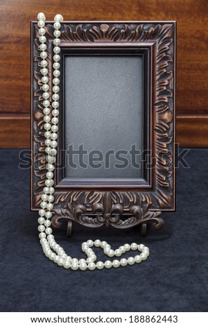 Portrait Chalk board in frame with wood background