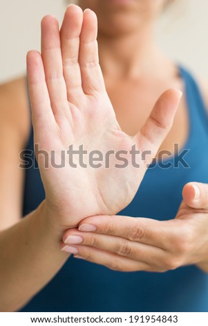 Woman\'s hands in classical Tai Chi pose