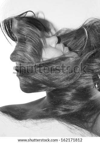 Double exposure portrait of beautiful young woman