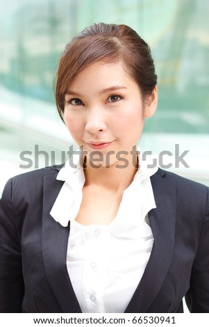 Friendly portrait of confident business woman