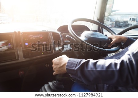 Truck driver,Truck driver keeps driving with hands.