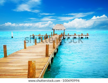 Vacations And Tourism Concept. Tropic Paradise. Jetty on Isla Mujeres, Mexico,Cancun