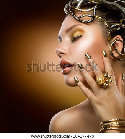 Golden Makeup.Fashion Girl Portrait