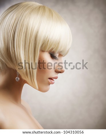 Haircut. Beautiful Girl with Healthy Short Blond Hair. Hairstyle