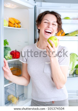 Diet.Dieting. Healthy Food concept, Beautiful Young Woman with Apple