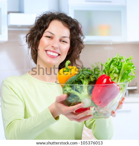 Beautiful Young Woman  with healthy food. Vegetables. Dieting concept .Diet.