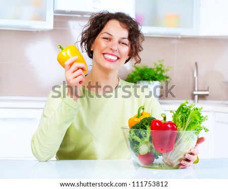 Beautiful Young Woman with Fresh Vegetables . Healthy food. Dieting concept .Diet. Vegetarian Food