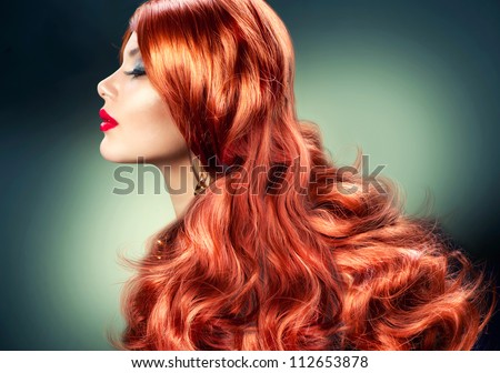 Fashion Red Haired Girl Portrait. Healthy Long Red Hair