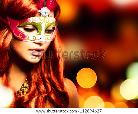 Party.Masquerade. Beautiful Girl in a Carnival mask over Holiday Blinking Background.