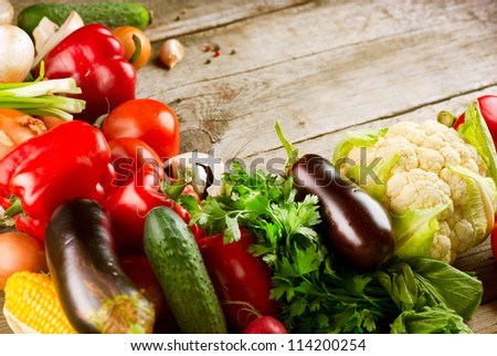 Healthy Organic Vegetables on a Wooden Background. Art Border Design