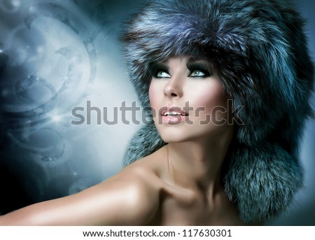 Fur Fashion. Beautiful Girl In Fur Hat. Winter Woman Portrait