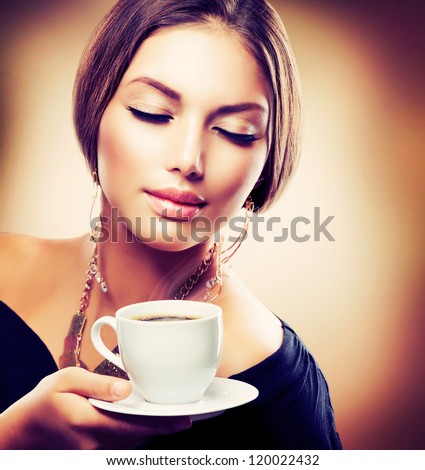 Coffee. Beautiful Girl Drinking Tea Or Coffee. Cup Of Hot Beverage.Sepia Toned