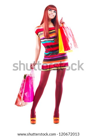 Fashion Shopping Girl full length Portrait. Beauty Woman with Shopping Bags isolated on White. Shopper. Sales