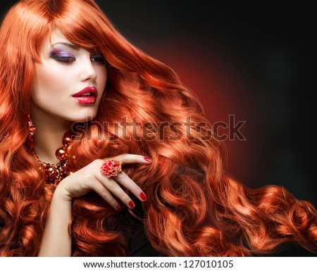 Red Hair. Fashion Girl Portrait. Long Curly Hair