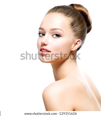 Beauty Girl. Portrait Of Beautiful Young Woman Looking At Camera. Isolated On White Background. Fresh Clean Skin