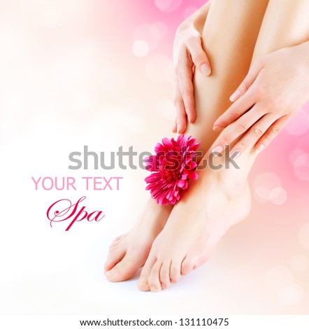 Woman\'s Feet and Hands isolated on white. Manicure and Pedicure concept. Nails. Spa. Skincare. Depilation. Epilation