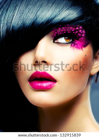 Fashion Brunette Model Portrait. Hairstyle. Haircut. Professional Makeup. False Eyelashes. Purple Make-Up