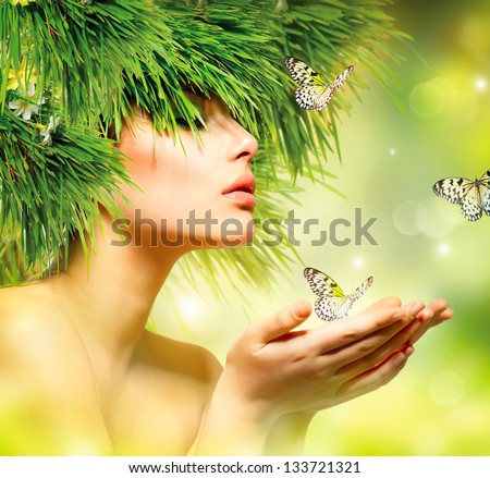 Spring Woman. Beauty Summer Girl With Grass Hair And Green Makeup. Butterflies. Nature Style. Environment Concept