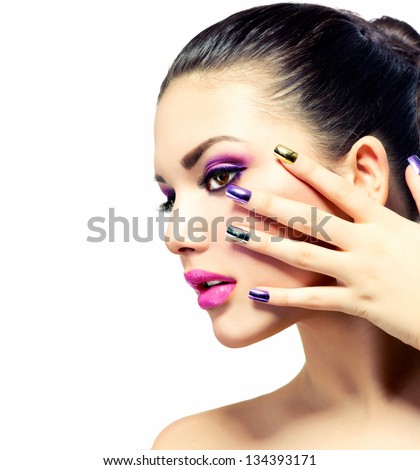 Fashion Beauty . Manicure And Make-Up. Nail Art. Beautiful Woman With Colorful Nails And Luxury Purple Makeup. Beautiful Girl Face And Hand