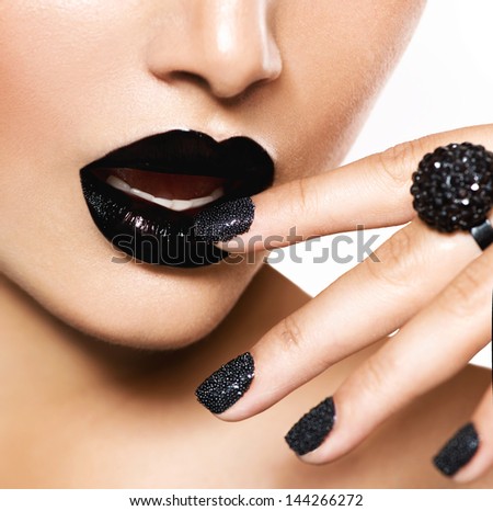 Trendy Black Caviar Manicure And Black Lips. Fashion Makeup And Manicure. Nail Art