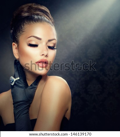 Beauty Fashion Glamour Girl Portrait. Vintage Style Girl Wearing Gloves. Jewellery. Jewelry. Glamor Hairstyle and Make-up. Diamond Ring. Retro Woman Portrait