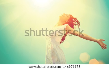 Free Happy Woman Enjoying Nature. Beauty Girl Outdoor. Freedom Concept. Beauty Girl Over Sky And Sun. Sunbeams. Enjoyment.