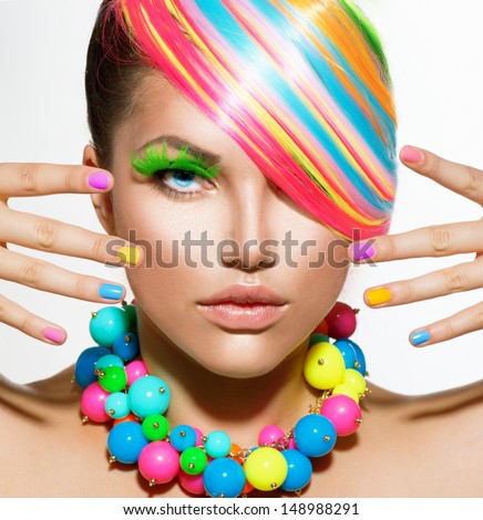 Beauty Girl Portrait With Colorful Makeup, Hair, Nail Polish And Accessories. Colourful Studio Shot Of Stylish Woman. Vivid Colors. Manicure And Hairstyle. Rainbow Colors