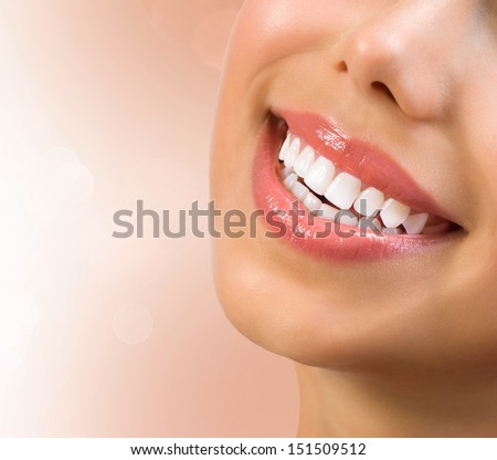 Healthy Smile. Teeth Whitening. Dental Care Concept. Woman Smile Closeup. Beautiful Lips And Teeth